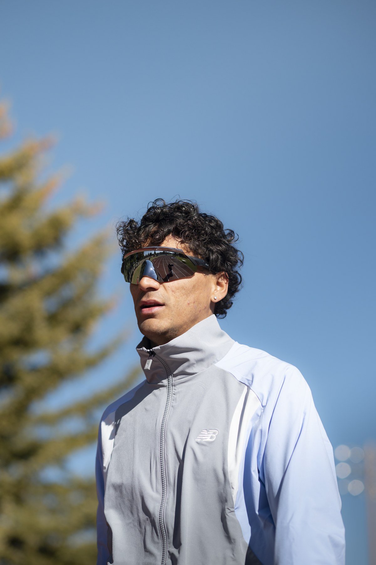 Athlete portrait with alpine background