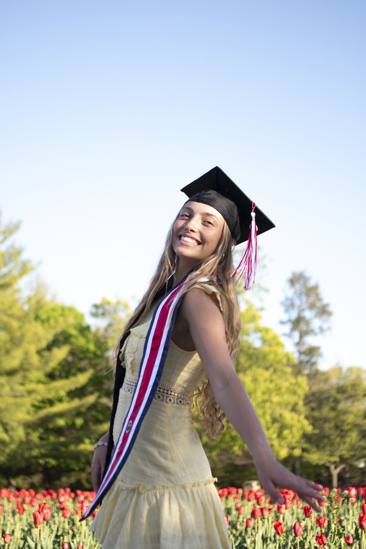 Graduation cap toss on campus