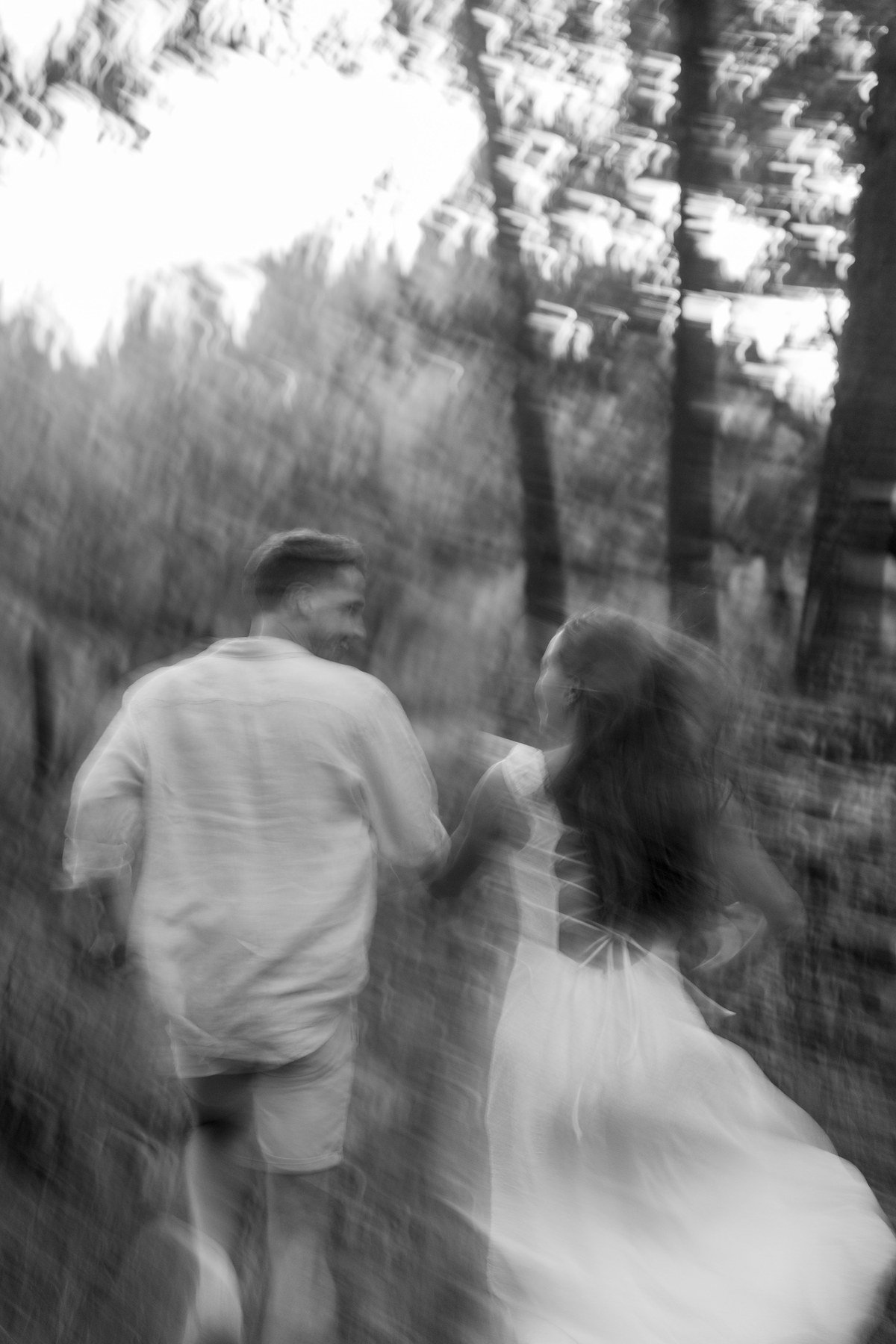 Couple running through forest — Mathis Chavand Photography